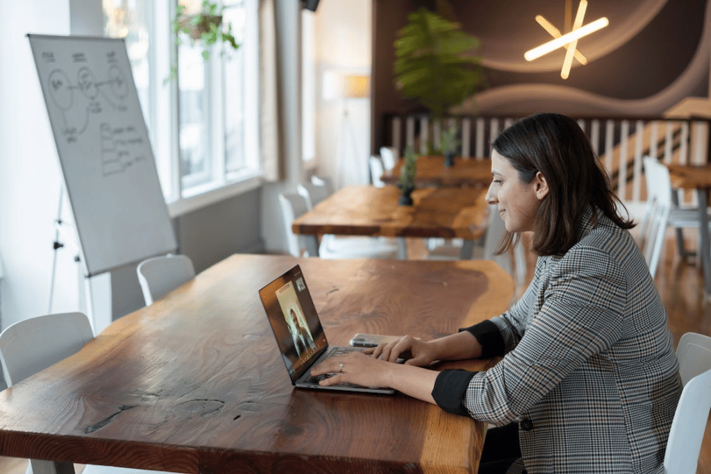 Woman on a video call in a meeting room